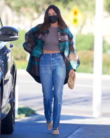 Megan Fox was spotted out in Calabasas, as she stopped for Gas. The actress showed off her fit physique in Jeans, a Crop top and an oversized plaid jacket. She wore a black face mask as she filled her own tank, before heading to a studio to work on a new project.Pictured: Megan FoxRef: SPL5215362 100321 NON-EXCLUSIVEPicture by: DIGGZY / SplashNews.comSplash News and PicturesUSA: 310-525-5808 UK: 020 8126 1009eamteam@shutterstock.comWorld Rights, No Portugal Rights, No Russia Rights