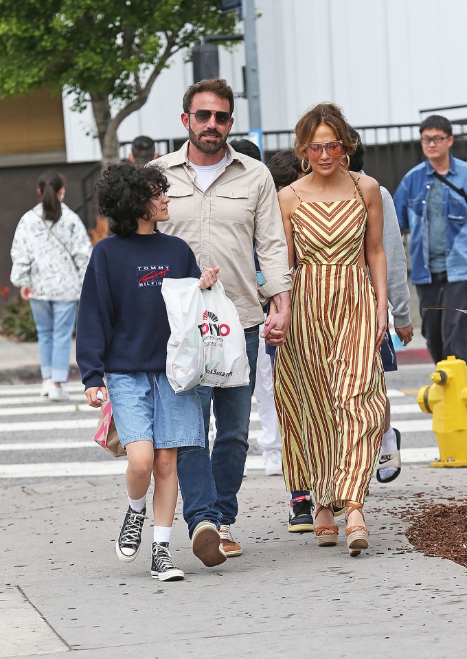 Ben Affleck and Jennifer Lopez share a kiss as they shop in Los Angeles