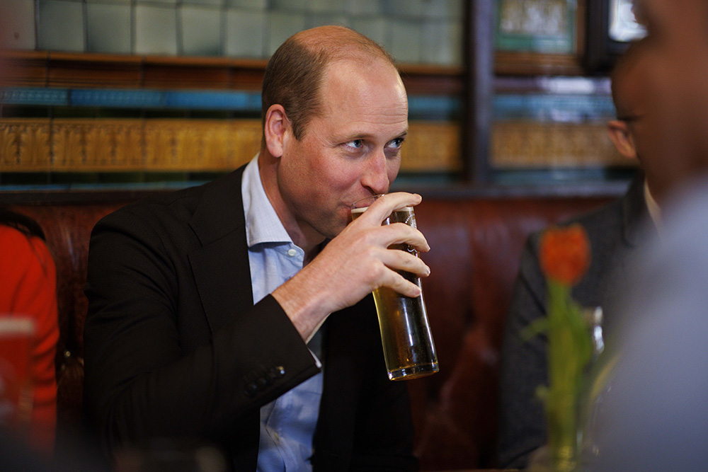 Prince William drinks a pint of cider as he chats to local business people inside the Dog and Duck pub.&#xA;&#xA;William, Prince of Wales and Catherine, Princess of Wales at the Dog and Duck pub in Soho ahead of this weekend's coronation.&#xA;Prince William and Catherine Princess of Wales visit to the Dog & Duck Pub, Soho, London, Soho, London, UK - 04 May 2023