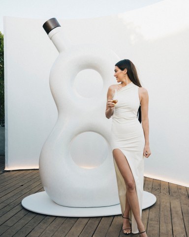 Kendall Jenner celebrated the launch of Eight Reserve by 818 at the second annual 8.18 party at Little Beach House Malibu on August 18. The model looked stunning in a white dress as she toasted the new ultra-premium Añejo Reserve from her award-winning 818 Tequila. She was joined by friends and family including Kim Kardashian, Khloe Kardashian, Kylie Jenner, Kris Jenner, Caitlyn Jenner and Hailey and Justin Bieber at the party. Other guests including Harry Hudson, Fai Khadra, Renell Medrano, Natalie Halcro, Olivia Pierson, Zack Bia and Taco. Guests were treated to neat pours of Eight Reserve, custom 818 cocktails and light bites, and posed for photos with a large recreation of the stylish Eight Reserve bottle. *BYLINE: Sophie Sahara/Mega. 18 Aug 2022 Pictured: Kendall Jenner celebrates the launch of Eight Reserve by 818 at the second annual 8.18 party at Little Beach House Malibu on August 18. *BYLINE: Sophie Sahara/Mega. Photo credit: Sophie Sahara/Mega TheMegaAgency.com +1 888 505 6342 (Mega Agency TagID: MEGA887761_001.jpg) [Photo via Mega Agency]