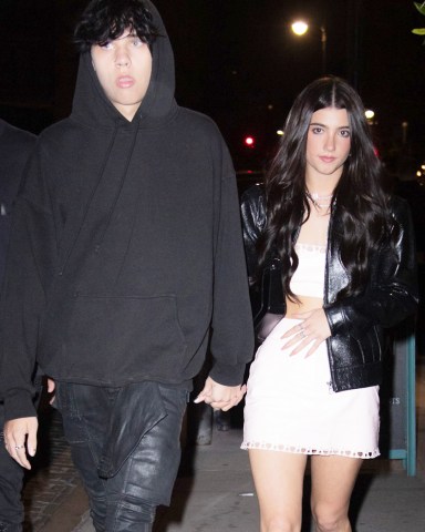 Landon Barker holds hands with rumored new girlfriend, TikTok star Charli D'Amelio as they leave Machine Dun Kelly's Madison Square Garden afterparty at Catch Steakhouse in New York. 

The rumored couple were joined by Charli's older sister and fellow TikTok star Dixie.  

Landon's father, Travis Barker was rushed to hospital in LA for an unknown illness.

Pictured: Landon Barker,Charli D'Amelio
Ref: SPL5322685 290622 NON-EXCLUSIVE
Picture by: WavyPeter / SplashNews.com

Splash News and Pictures
USA: +1 310-525-5808
London: +44 (0)20 8126 1009
Berlin: +49 175 3764 166
photodesk@splashnews.com

World Rights