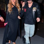 Mariah Carey wore a see-through black dress while leaving with beau Bryan Tanaka The St. Regis New York