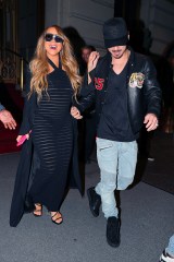 Mariah Carey wore a see-through black dress while leaving with beau Bryan Tanaka The St. Regis New York. 11 Oct 2022 Pictured: Mariah Carey and Bryan Tanaka. Photo credit: ZapatA/MEGA TheMegaAgency.com +1 888 505 6342 (Mega Agency TagID: MEGA906810_015.jpg) [Photo via Mega Agency]
