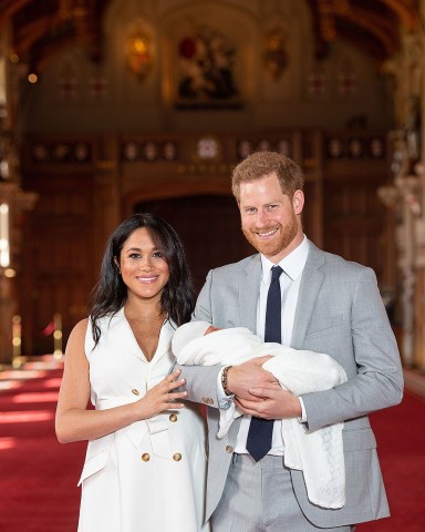 Editorial use only.Mandatory Credit: Photo by Domic Lipinski/PA/EPA-EFE/Shutterstock (10231477c)Prince Harry (R) and Meghan Duchess of Sussex pose together with their newborn son Archie Harrison Mountbatten-Windsor in WindsorPrince Harry and Meghan Duchess of Sussex new baby photocall, Windsor Castle, UK - 08 May 2019