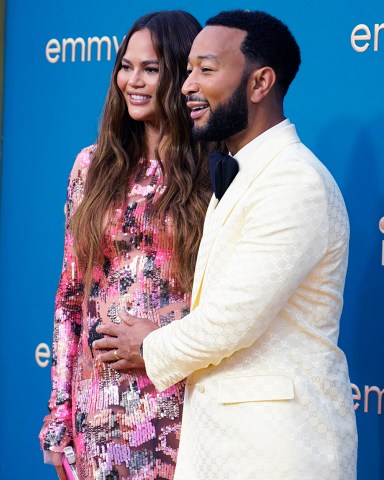 Chrissy Teigen, left, and John Legend arrive at the 74th Primetime Emmy Awards, at the Microsoft Theater in Los Angeles
2022 Primetime Emmy Awards - Arrivals, Los Angeles, United States - 12 Sep 2022
