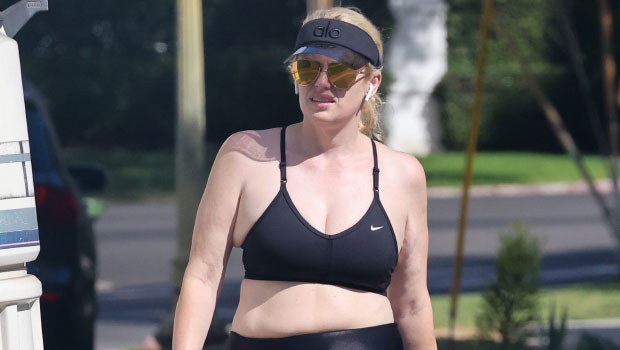 Rebel Wilson showcases her abs in stomach-baring sports bra and