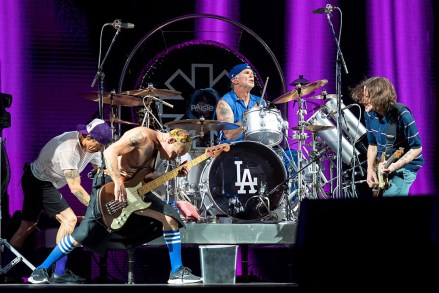 Anthony Kiedis, from left, Flea, Chad Smith, and John Frusciante of the Red Hot Chili Peppers perform at Soldier Field, in Chicago
Red Hot Chili Peppers in Concert - , Chicago, United States - 19 Aug 2022
