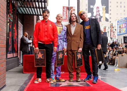 Anthony Kiedis, from left, Flea, John Frusciante and Chad Smith, of Red Hot Chili Peppers, attend a ceremony honoring the band with a star on the Hollywood Walk of Fame, in Los Angeles
Red Hot Chili Peppers Honored with a Star on the Hollywood Walk of Fame, Los Angeles, United States - 31 Mar 2022