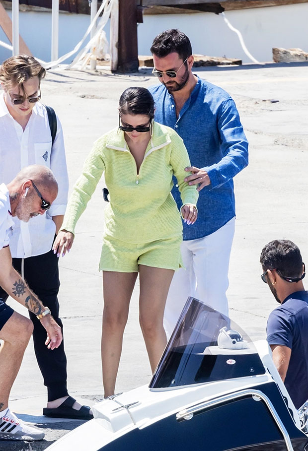 Selena Gomez Wears Green Outfit Shopping at Louis Vuitton Shop in