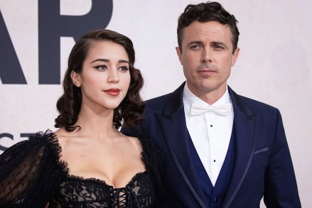 Actor Casey Affleck and his girlfriend, Caylee Cowan, pose