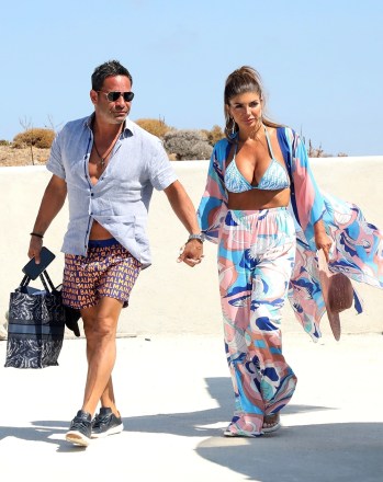 Mykonos, GREECE  - *EXCLUSIVE*  - Newly married Original cast member of The Real Housewives of New Jersey Teresa Giudice and husband Luis 'Louie' Ruelas are pictured traveling in style as they are seen enjoying a Helicopter ride on their Honeymoon in Mykonos.**SHOT ON 08/14/2022**Pictured: Teresa Giudice, Luis 'Louie' RuelasBACKGRID USA 22 AUGUST 2022 USA: +1 310 798 9111 / usasales@backgrid.comUK: +44 208 344 2007 / uksales@backgrid.com*UK Clients - Pictures Containing ChildrenPlease Pixelate Face Prior To Publication*