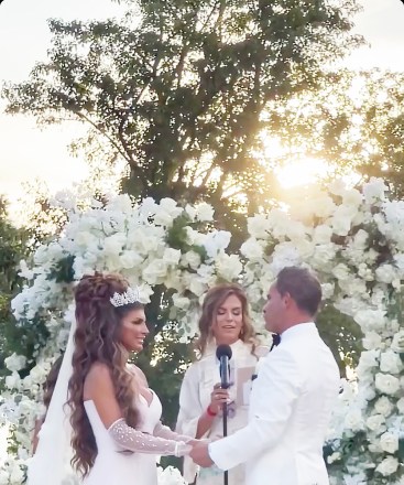 New Brunswick, NJ - *EXCLUSIVE* - *USA and Canada customers should call for rights* Teresa Giudice ties the knot again... and TMZ has got video of the moment 'New Jersey The 'Real Housewives' star said "I do!"Teresa and fiancé Luis Ruellas got married Saturday night in front of 200 hundred family and friends at the Fancy Park Chateau Estate & Gardens in New Brunswick, NJ.  Louis' sister, Dr. Veronica Ruellas, performed the wedding.  Our video captured the 2 lovebirds holding hands face to face and surrounded by white roses as Veronica read their vows.  After Louis said, "I do," His sister turned to Teresa and asked, "And Teresa do you take Louis as your husband, your best friend and partner in life?  Teresa smiled and said, "yes i do" Veronica turns comedian... "To see endless dog hair on your white furniture?"Looking up at the sky, Teresa laughed and then said "Yes" Before Veronica wrapped up and made it official.  By the way, Teresa looked gorgeous in her all-white dress with long vale and tiara.  Louis didn't look too shabby in his white blazer and black slacks either.  Of course, Teresa's 4 daughters - Gia, Gabriella, Milania and Audriana - were in attendance and wore pale pink gowns.  Louis's 2 sons, David and Nicholas, also enjoyed the festivities.  The children helped light the ceremony's unity candles after Teresa walked down the aisle to the sound of the violin and song, "Ave Maria," To honor his late parents.  RHONJ co-stars Jennifer Aydin, Dolores Catania and Margaret Joseph, reportedly 