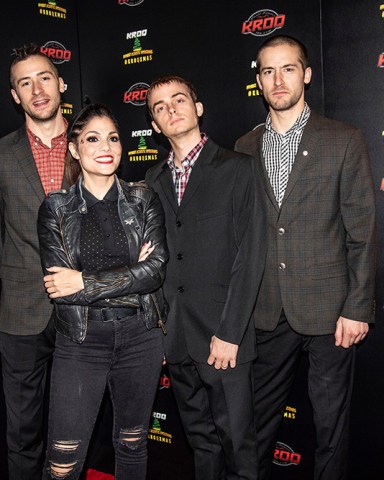 Justin Bivona, Aimee Interrupter, Kevin Bivona, Jesse Bivona. Justin Bivona, from left, Aimee Interrupter, Kevin Bivona and Jesse Bivona of The Interrupters pose at the 2018 KROQ Absolut Almost Acoustic Christmas at The Forum, in Inglewood, Calif
KROQ Absolut Almost Acoustic Christmas 2018 - Day 1, Inglewood, USA - 08 Dec 2018