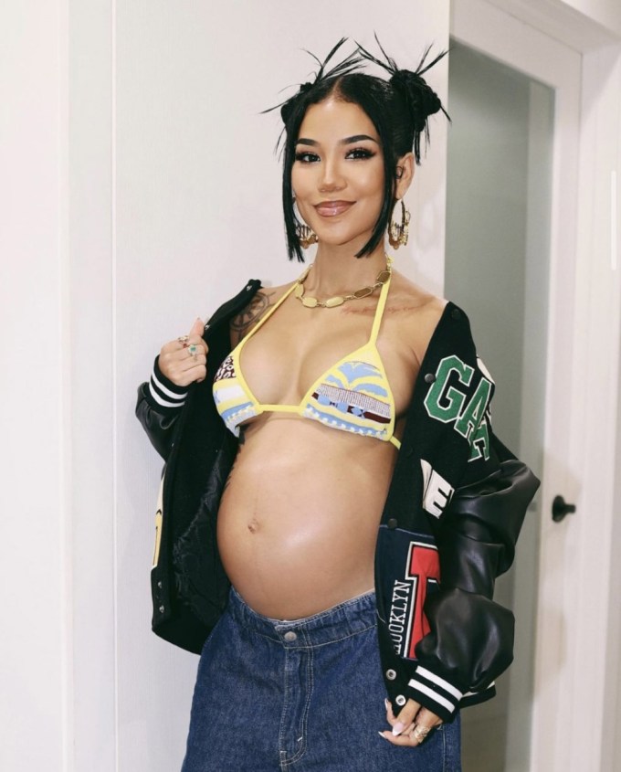 JHENÉ AIKO BARES BABY BUMP WEARING EDIKTED VARSITY JACKET