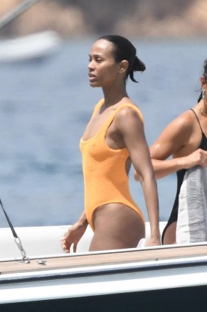 Sardinia, ITALY  - *EXCLUSIVE*  - Actress Zoe Saldana with her husband Marco Perego and their children, enjoy a swim in the Pevero beach in Sardinia, before getting back on their yacht and continuing the cruise in the beautiful Italian seas.

Zoe looked sexy showing off her figure wearing her striking orange swimsuit.

Pictured: Zoe Saldana

BACKGRID USA 23 JULY 2023 

BYLINE MUST READ: FREZZA LA FATA - COBRA TEAM / BACKGRID

USA: +1 310 798 9111 / usasales@backgrid.com

UK: +44 208 344 2007 / uksales@backgrid.com

*UK Clients - Pictures Containing Children
Please Pixelate Face Prior To Publication*
