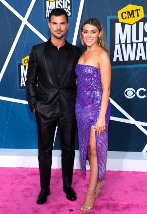 Taylor Lautner, left, and Taylor Dome arrive at the CMT Music Awards, at the Municipal Auditorium in Nashville, Tenn
2022 CMT Music Awards - Arrivals, Nashville, United States - 11 Apr 2022