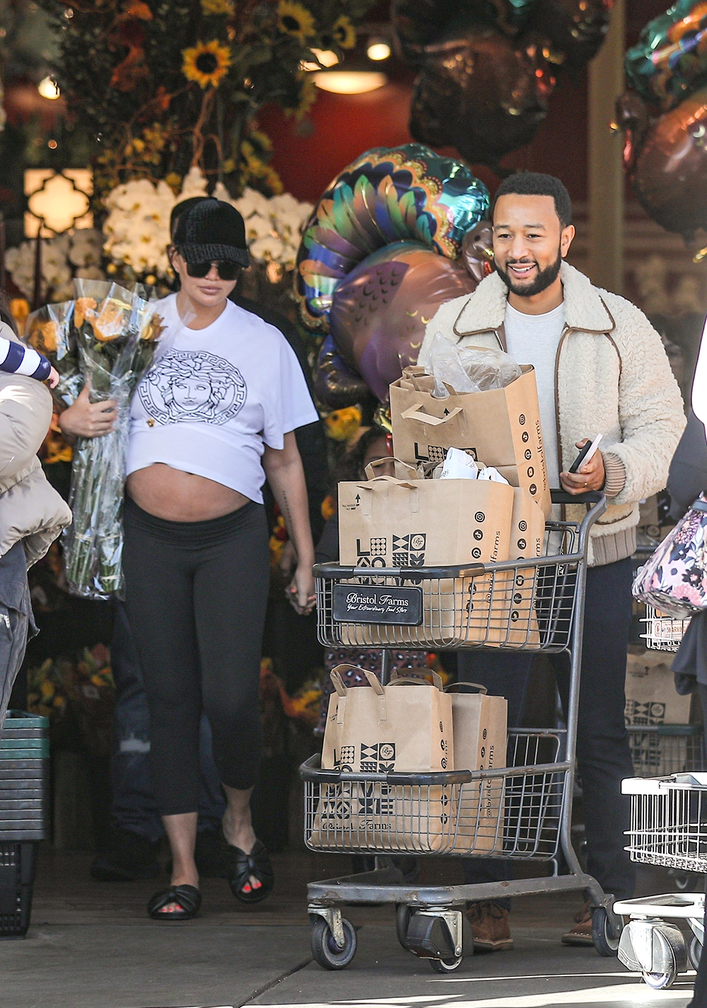 Pregnant Chrissy Teigen and John Legend prep for Thanksgiving with some grocery shopping in Beverly Hills