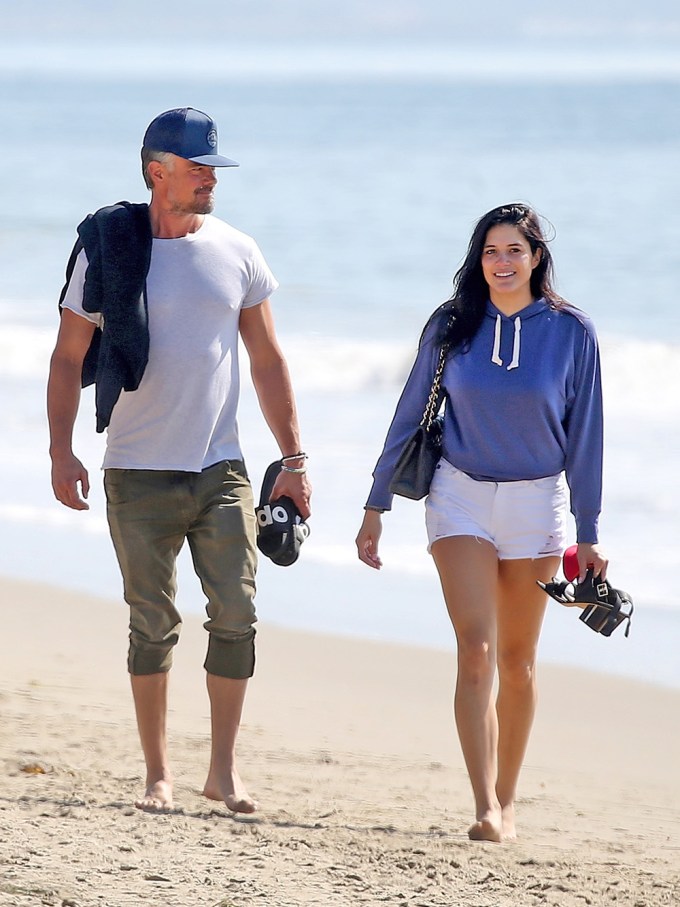 Josh Duhamel and girlfriend Audra Mari having a romantic walk on the beach