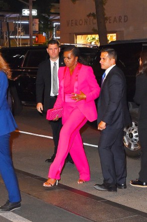 New York, NY  - Michelle Obama wears a hot pink suit as she arrives at the George Clooney's Albie Awards after party at The Mark Hotel in New York City.Pictured: Michelle ObamaBACKGRID USA 29 SEPTEMBER 2022 BYLINE MUST READ: JosiahW / BACKGRIDUSA: +1 310 798 9111 / usasales@backgrid.comUK: +44 208 344 2007 / uksales@backgrid.com*UK Clients - Pictures Containing ChildrenPlease Pixelate Face Prior To Publication*