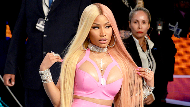 Nicki Minaj Channels Barbie As She Poses In Sexy Pink Outfit & Boots