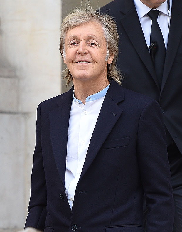 Sir Paul McCartney, 80, stands on his HEAD as he practices yoga