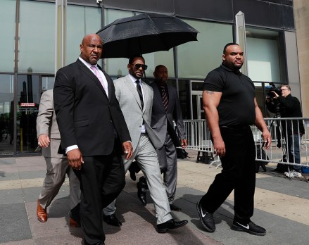 R Kelly. Musician R. Kelly, center, departs from the Leighton Criminal Court building after pleading not guilty to 11 additional sex-related charges, in Chicago
R Kelly, Chicago, USA - 06 Jun 2019