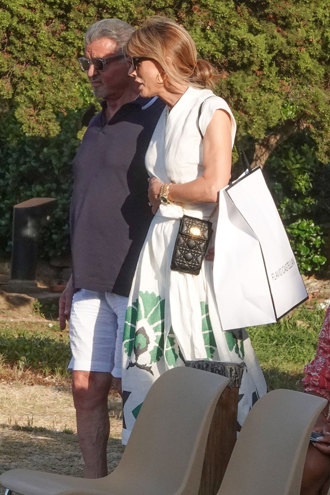 Sylvester Stallone and Jennifer Flavin walking in Italy