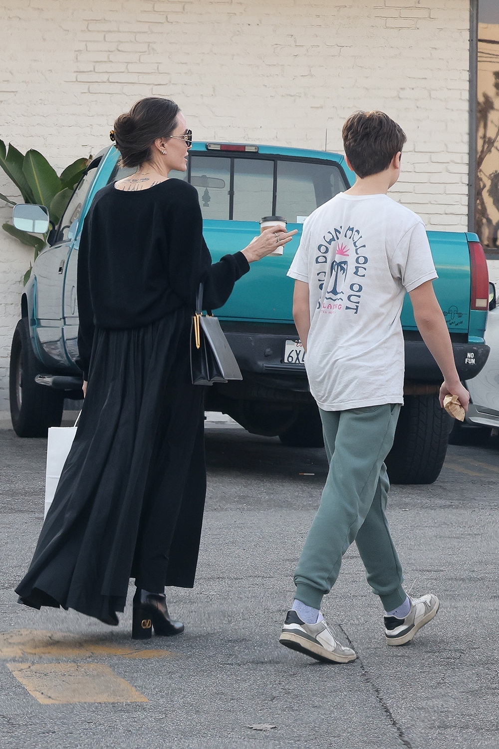 *EXCLUSIVE* Angelina Jolie grabs food to go with her son Knox