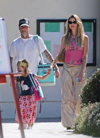 SANTA BARBARA, Calif. - Adam Levine and his pregnant wife Behati Prinsloo look happy together amid a cheating scandal while out as a family in Santa Barbara. Photo by: Adam Levine, Behati Prinsloo BACKGRID USA 21 September 2022 USA: +1 310 798 9111 / usasales@backgrid.com UK: +44 208 344 2007 / uksales@backgrid.com Publications*