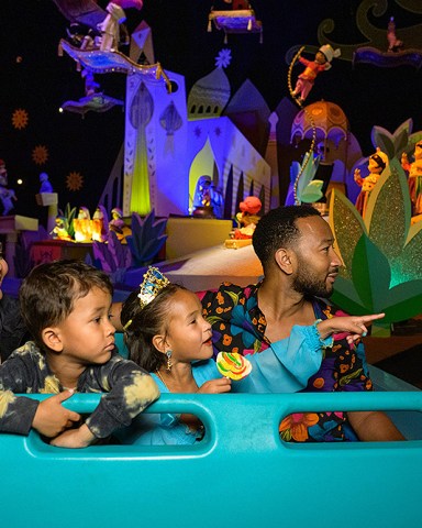 Chrissy Teigen, John Legend and their kids, Luna and Miles, enjoy a whimsical voyage on 'it's a small world' at Disneyland Park in Anaheim, Calif., April 14, 2022, complete with a cast of nearly 300 audio-animatronics dolls representing children from every corner of the globe singing the classic anthem.
Chrissy Teigen and John Legend celebrate Daughter Luna's Birthday at Disneyland Resort, Anaheim, California, USA - 14 Apr 2022