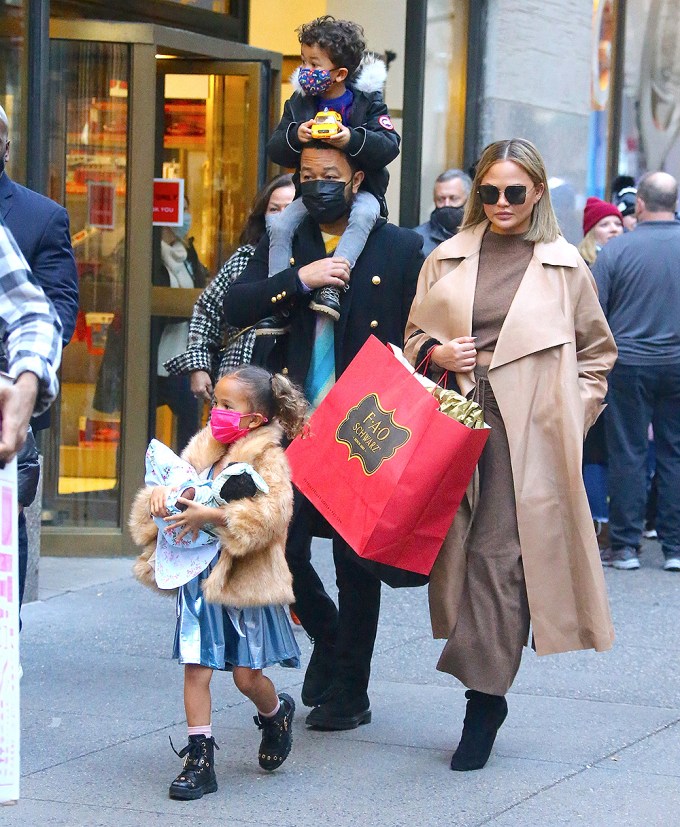 John Legend & Chrissy Teigen Shop in NYC With Their Kids
