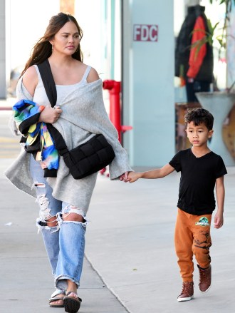 John Legend and Chrissy Teigen are spotted with their son Miles along Melrose Avenue in West Hollywood, CaPictured: Chrissy Teigen and son MilesRef: SPL5520797 080223 NON-EXCLUSIVEPicture by: London Entertainment / SplashNews.comSplash News and PicturesUSA: +1 310-525-5808London: +44 (0)20 8126 1009Berlin: +49 175 3764 166photodesk@splashnews.comWorld Rights