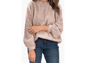A woman wearing a sweater.