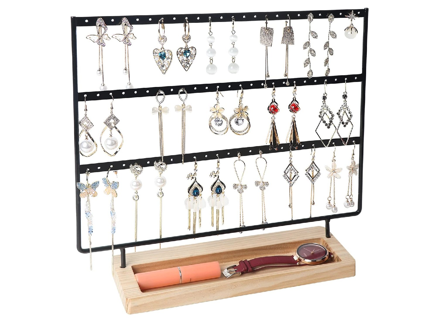 Earrings hanging from an organizer rack.