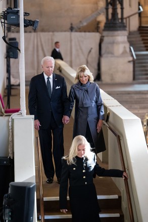 Editorial use only. MANDATORY CREDIT HANDOUT /NO SALE Mandatory Credit: Photo by ANDY BAILEY/UK PARLIAMENT/HANDOUT/EPA-EFE/Shutterstock (13400508e) A handout photo released by Parliament British shows US President Joe Biden and US First Lady Jill Biden attend the Lying-in-State of Britain's Queen Elizabeth II at the Palace of Westminster in London, Britain on September 18, 2022. The Queen lying in state will last four days, ending on the morning of the state funeral on September 19. Queen Elizabeth's body is on display at Westminster Hall in London, UK - September 18, 2022