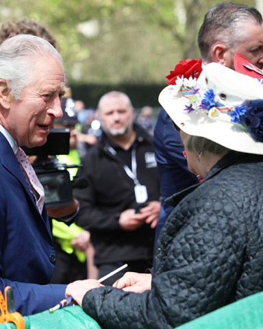 King Charles III shakes members of the public's hands as he did an impromptu walkabout on The Mall the day before his Coronation in London on Friday, May 05, 2023.Thousands of people from around the world are expected to arrive in London for the Coronation over the next few days.
King Charles III Coronation Preparations, London, England - 05 May 2023