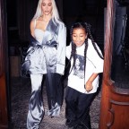 *EXCLUSIVE* Kim Kardashian slays in an off-the-shoulder look as she exits photo shoot with daughter North West