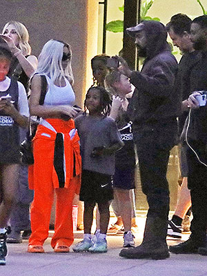Kim Kardashian Attends Saint West's Basket Ball Game in Nike Sneakers –  Footwear News