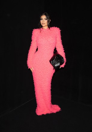 Kylie Jenner wears bright Pink at the Balenciaga Show in Paris. 02 Oct 2022 Pictured: Kylie Jenner. Photo credit: TheRealSPW / MEGA TheMegaAgency.com +1 888 505 6342 (Mega Agency TagID: MEGA903392_002.jpg) [Photo via Mega Agency]