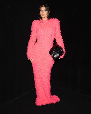 Kylie Jenner wears bright Pink at the Balenciaga Show in Paris. 02 Oct 2022 Pictured: Kylie Jenner. Photo credit: TheRealSPW / MEGA TheMegaAgency.com +1 888 505 6342 (Mega Agency TagID: MEGA903392_002.jpg) [Photo via Mega Agency]