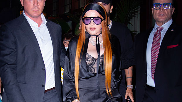 Madonna Debuts New Strawberry Blonde Hair Makeover & Sheer Lace Bra At NYFW