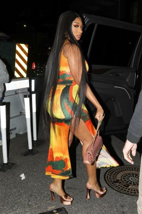 Beverly Hills, CA  - *EXCLUSIVE*  - Rapper Megan Thee Stallion shows off her curvy physique in a yellow/orange dress as she's seen leaving Asian fusion restaurant Crustacean's after celebrating her 28th birthday party with friends in Beverly Hills. Megan and her friends celebrated at the restaurant for 3 hours until leaving at around 12 midnight. Her friends were seen loading up Megan’s car with many high end gifts from Chanel to Louis Vuitton and so on.Pictured: Megan Thee StallionBACKGRID USA 16 FEBRUARY 2023 USA: +1 310 798 9111 / usasales@backgrid.comUK: +44 208 344 2007 / uksales@backgrid.com*UK Clients - Pictures Containing ChildrenPlease Pixelate Face Prior To Publication*