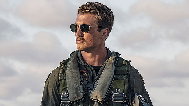 Miles Teller Jokes He ‘Grew A Mustache’ For ‘Top Gun’ While Tom Cruise ‘Did His Own Stunts’ On ‘SNL’