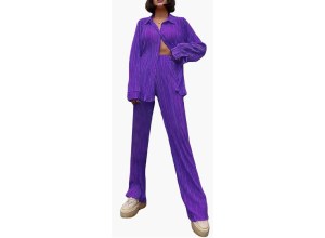 A women in a purple pants set.