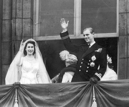 The Royal Wedding of Princess Elizabeth (Queen Elizabeth II) and Prince Philip (Duke of Edinburgh) at Westminster Abbey on November 20, 1947. A photo shows the couple waving to the crowd on the balcony of Buckingham Palace.  The royal wedding of Princess Elizabeth (Queen Elizabeth II) and Prince Philip (Duke of Edinburgh) at Westminster Abbey on November 20, 1947. A photo shows the couple waving to the crowd on the balcony of Buckingham Palace.