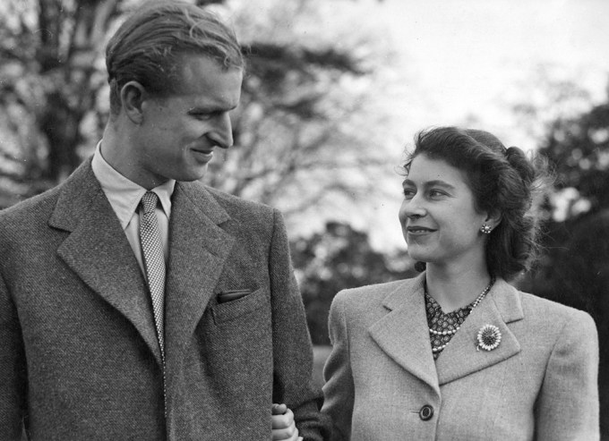 Queen Elizabeth II Smiles At Prince Philip