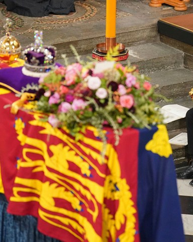 King Charles III sits in front of the coffin of Queen Elizabeth II during the funeral service of Queen Elizabeth II at Westminster Abbey in central London, . The Queen, who died aged 96 on Sept. 8, will be buried at Windsor alongside her late husband, Prince Philip, who died last year
Royals Funeral, London, United Kingdom - 19 Sep 2022