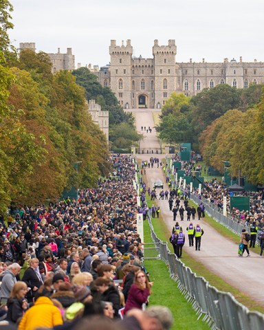 Mourners line the route of Queen Elizabeth II's funeral procession on the Long Walk at Windsor Castle, Britain, 19 September 2022. The late Queen Elizabeth II will be buried inside the King George VI Memorial Chapel within St George's Chapel at Windsor alongside her late husband the Duke of Edinburgh. Britain's Queen Elizabeth II died at her Scottish estate, Balmoral Castle, on 08 September 2022. The 96-year-old Queen was the longest-reigning monarch in British history.
The Funeral of Queen Elizabeth II, Windsor, United Kingdom - 19 Sep 2022