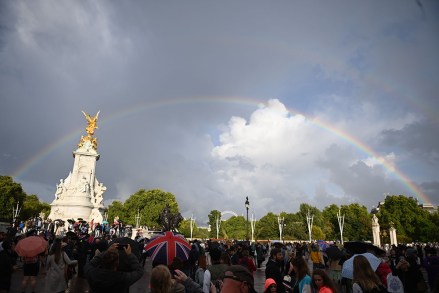 A rainbow appears above the Queen Victoria Memorial as people gather in front of Buckingham Palace in London, Britain, 08 September 2022. According to a Buckingham Palace statement on 08 September 2022, Britain's Queen Elizabeth II is under medical supervision at Balmoral Castle, upon the advice of her doctors concerned for the health of the 96-year-old monarch.
Queen Elizabeth reported to be under medical supervision, London, United Kingdom - 08 Sep 2022