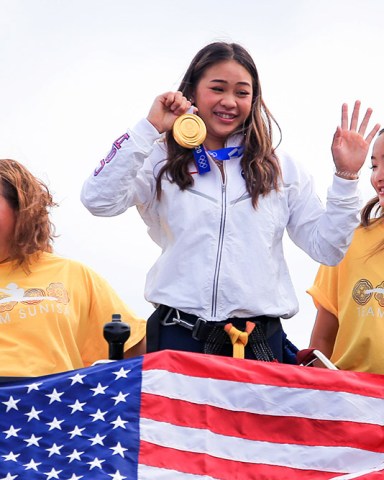 A parade is held to celebrate the success and homecoming of Sunisa Lee, the first Hmong American to compete in the Olympics. At the Tokyo 2020 Olympic Games, Lee, an 18-year-old gymnast who hails from St. Paul, earned the gold medal for women's artistic individual all-around, silver for women's artistic team all-around, and bronze for women's uneven bars.
Olympian Sunisa Lee celebration parade, Saint Paul, Minnesota, USA - 08 Aug 2021